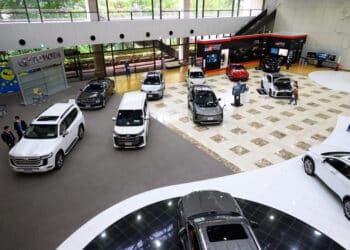 Toyota Motor vehicles on display at the company's showroom in Toyota City. Photographer: Akio Kon/Bloomberg