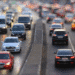 cars on road with blurry background of headlights