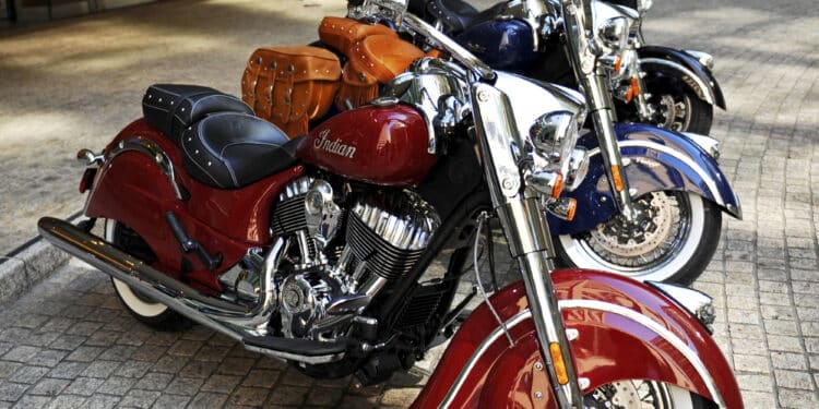 The new line of Indian Motorcycle Co. 2014 Indian Chief motorcycles are displayed for a photograph in New York, U.S., on Monday, Aug. 5, 2013. The Chief Classic in red sits in front of the Chief Vintage in blue and the Chieftan in black. Indian Motorcycle Co., a subsidiary of Polaris Industries Inc., announced today the details for the new 2014 Indian Chief family of motorcycles. Photographer: Peter Foley/Bloomberg