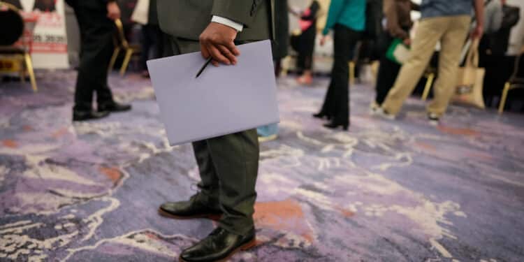 Job seekers attend a Diversity Career Group job fair in Los Angeles, California, US, on Thursday, April 17, 2025. Applications for US unemployment benefits fell to the lowest level in two months, consistent with a stable labor market.