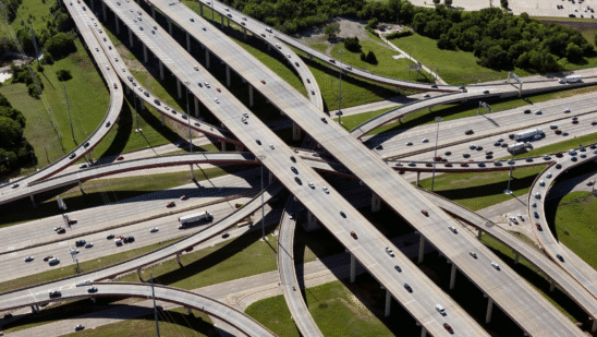 aerial shot of cars on many connected roads