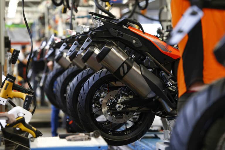 Partly-assembled KTM 1290 super adventure motorcycles sit on the assembly line inside the KTM-Sportmotorcycle AG motorcycle manufacturing facility in Mattighofen, Austria, on Monday, April 29, 2019. As Austria emerged from the rubble of World War II, KTM churned out inexpensive, durable two-wheelers to help a broken nation hit the road again. Photographer: Michaela Handrek-Rehle/Bloomberg