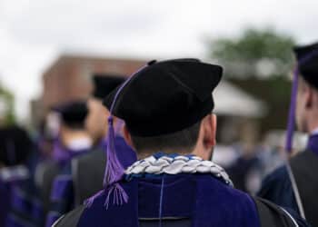 Graduates at the Georgetown University Law Center commencement ceremony in Washington, DC, US, on Sunday, May 19, 2024. Speaking via pre-recorded video after testing positive for Covid-19, Federal Reserve Chair Jerome Powell made a pitch for public service to the recently minted graduates at his alma mater. Photographer: Al Drago/Bloomberg