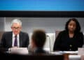 Jerome Powell, chairman of the US Federal Reserve, left, and Lisa Cook, governor of the US Federal Reserve, during the Federal Reserve Board open meeting in Washington, DC, US, on Wednesday, June 25, 2025. The Federal Reserve unveiled plans to roll back an important capital rule that big banks have said limits their ability to hold more Treasuries and act as intermediaries in the $29 trillion market. Photographer: Al Drago/Bloomberg