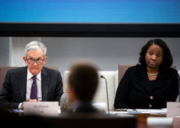 Jerome Powell, chairman of the US Federal Reserve, left, and Lisa Cook, governor of the US Federal Reserve, during the Federal Reserve Board open meeting in Washington, DC, US, on Wednesday, June 25, 2025. The Federal Reserve unveiled plans to roll back an important capital rule that big banks have said limits their ability to hold more Treasuries and act as intermediaries in the $29 trillion market. Photographer: Al Drago/Bloomberg