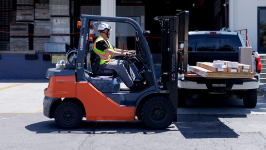A worker drives a forklift outside a Foundation Building Materials warehouse in Los Angeles, California, US, on Wednesday, Aug. 20, 2025. Lowes Cos. agreed to buy Foundation Building Materials for about $8.8 billion in cash, accelerating the home-improvement supplier's push to serve more professional customers. Photographer: Eric Thayer/Bloomberg