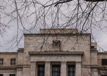 Fed cuts rates with three dissents, projects one cut in 2026