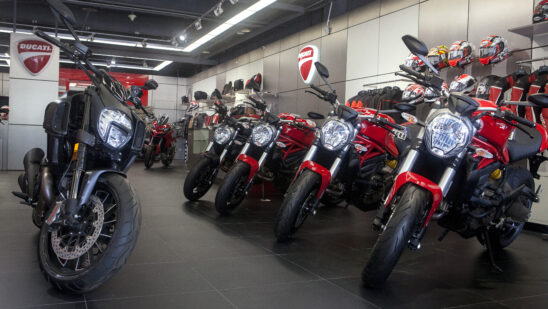 A Ducati Diavel Dark motorcycle, left, stands next to four Ducati Monster 821 motorcycles manufactured by Ducati Motor Holding SpA at the company's showroom in Beijing, China, on Friday, Aug. 5, 2016. With China's motorcycle market in decline, makers of superbikes are adding lighter, sleeker and less powerful models to their offering, trying to appeal to well-heeled novice riders and, especially, women.