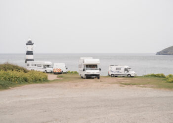 Campervans and motorhomes parked at Penmon Point in Anglesey, UK, on Saturday, April 30, 2022. Anglesey is where the government's new energy strategy and its economic vision meet, but some locals are skeptical.
