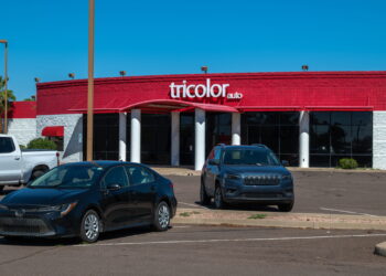 Car auction firm reports nearly $19M Tricolor-linked loss