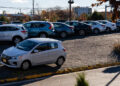 Used vehicles at a dealership in Falls Church, Virginia, US, on Tuesday, Nov. 11, 2025. With ongoing inflation pressures and the return of student loan bills, millions of car owners are struggling to afford their monthly payments.