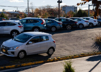 Used vehicles at a dealership in Falls Church, Virginia, US, on Tuesday, Nov. 11, 2025. With ongoing inflation pressures and the return of student loan bills, millions of car owners are struggling to afford their monthly payments.