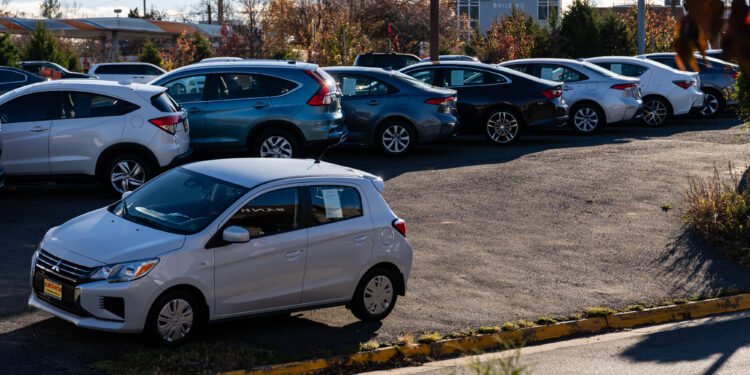 Used vehicles at a dealership in Falls Church, Virginia, US, on Tuesday, Nov. 11, 2025. With ongoing inflation pressures and the return of student loan bills, millions of car owners are struggling to afford their monthly payments.
