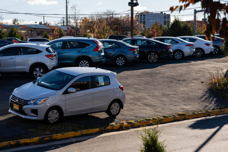 Used vehicles at a dealership in Falls Church, Virginia, US, on Tuesday, Nov. 11, 2025. With ongoing inflation pressures and the return of student loan bills, millions of car owners are struggling to afford their monthly payments.