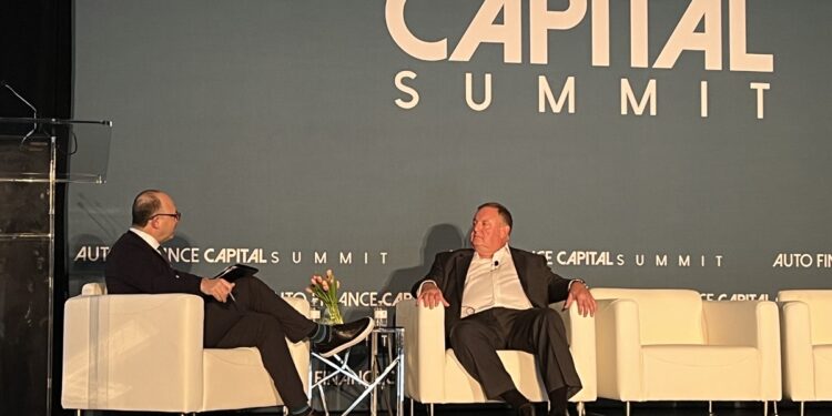 (From left: Royal Media CEO JJ Hornblass and Stellantis Financial Services Executive Vice President and Chief Financial Officer Bennie Duck at Auto Finance Capital Summit 2026 | Auto Finance News)