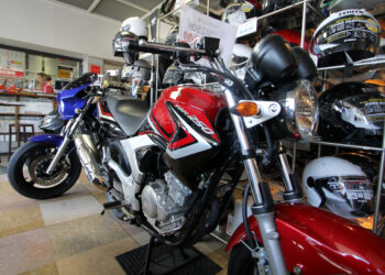 Yamaha Motor Co. motorcycles are displayed at a dealership in Tokyo, Japan, on Tuesday, Feb. 15, 2011. Yamaha Motor Corp., the world's second-biggest motorcycle maker, posted full-year profit of 18.30 billion yen, the company said in a statement today.