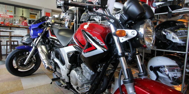 Yamaha Motor Co. motorcycles are displayed at a dealership in Tokyo, Japan, on Tuesday, Feb. 15, 2011. Yamaha Motor Corp., the world's second-biggest motorcycle maker, posted full-year profit of 18.30 billion yen, the company said in a statement today.