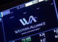 Investor tied to troubled bank loans charged with fraud by US