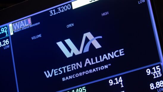 Investor tied to troubled bank loans charged with fraud by US