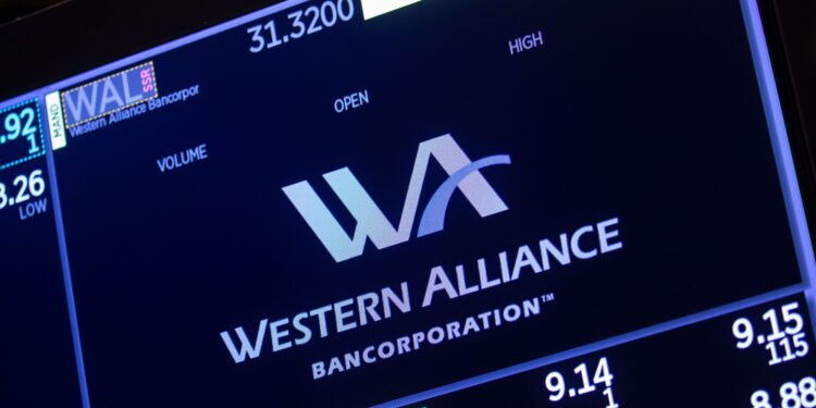Investor tied to troubled bank loans charged with fraud by US
