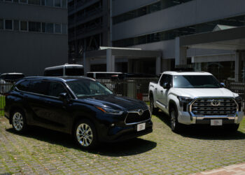 A US-manufactured Toyota Motor Corp. Tundra pickup truck, right, and Highlander SUV displayed in Tokyo, Japan, on Monday, May 18, 2026. Toyota has filed for approval to build a new manufacturing facility in Texas, building on momentum in the US as President Donald Trump pressures carmakers to bolster domestic production.
