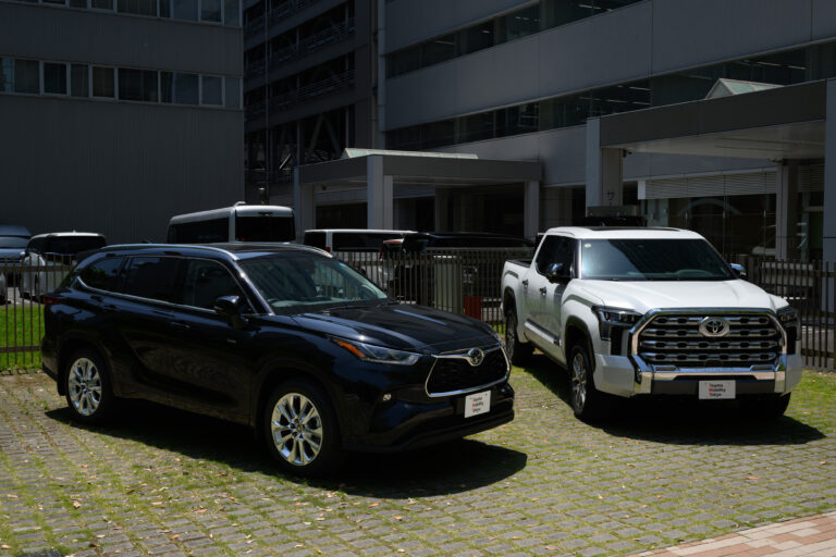 A US-manufactured Toyota Motor Corp. Tundra pickup truck, right, and Highlander SUV displayed in Tokyo, Japan, on Monday, May 18, 2026. Toyota has filed for approval to build a new manufacturing facility in Texas, building on momentum in the US as President Donald Trump pressures carmakers to bolster domestic production.