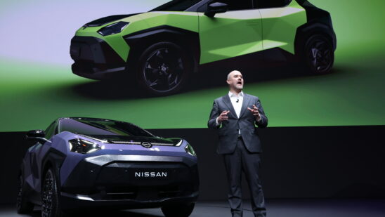 Ivan Espinosa, chief executive officer of Nissan Motor Co., speaks next to a Juke compact crossover SUV at the companys headquarters in Yokohama, Japan, on Tuesday, April 14, 2026. A year after taking charge of ailing automaker, Espinosa has unveiled a makeover to freshen its aging lineup and set ambitious targets to boost US and China sales to levels not seen in years.