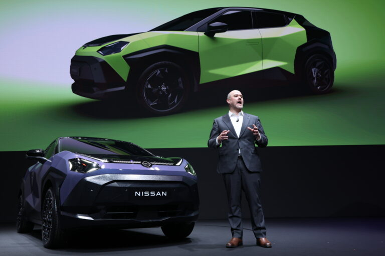 Ivan Espinosa, chief executive officer of Nissan Motor Co., speaks next to a Juke compact crossover SUV at the companys headquarters in Yokohama, Japan, on Tuesday, April 14, 2026. A year after taking charge of ailing automaker, Espinosa has unveiled a makeover to freshen its aging lineup and set ambitious targets to boost US and China sales to levels not seen in years.