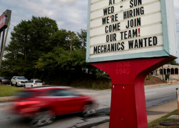US job openings edged down in June, layoffs remained limited